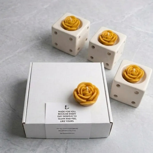 The yellow rose wax melts box beautifully styled on a minimalist wooden tray, adding a cozy, warm accent to modern living room decor