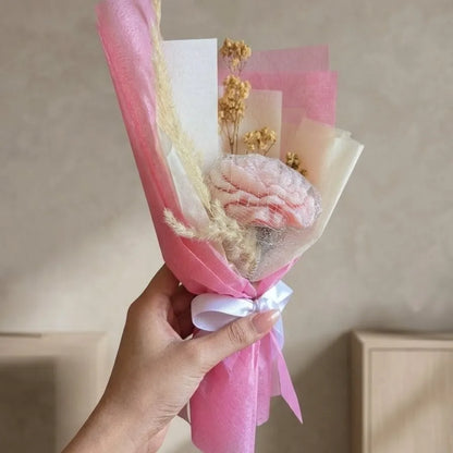 Macro close-up shot highlighting the seamless gradient shading and elegant wax petal textures of the handcrafted pink peony bouquet candle
