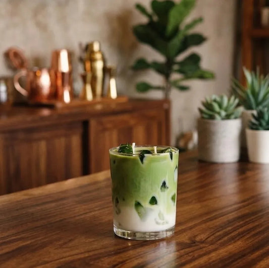 The premium iced matcha latte scented jar candle displayed elegantly side-by-side with its matching lid, showcasing a clean, sober presentation